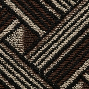 Woven fabric texture, geometric pattern in brown, cream, and black, diagonal lines and stepped shapes, tight weave, matte finish, cierre1972.